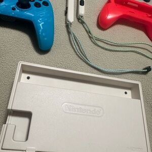 Nintendo Switch Console with Blue and Red Joy-Con Controllers